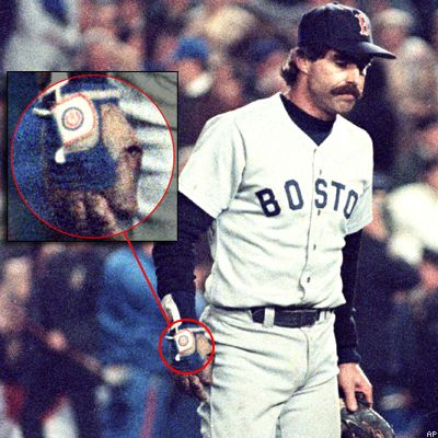 Bill Buckner walks off the field (wearing a Cubs batting glove) after his critical error in the 86 World Series.