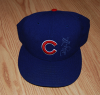 Randy Wells Game Used Hat acquired via Randy Wells in person at our CBB private autograph signing on 9/29/09